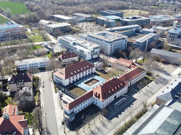 Aerial view of the Dresden University of Technology campus, showing several buildings and roads.