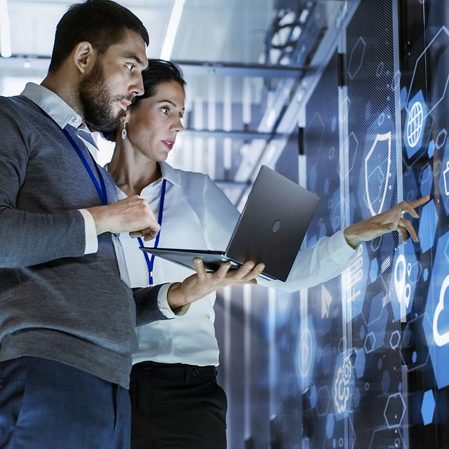 Two employees are using digital registers thanks to Telekom’s register modernisation