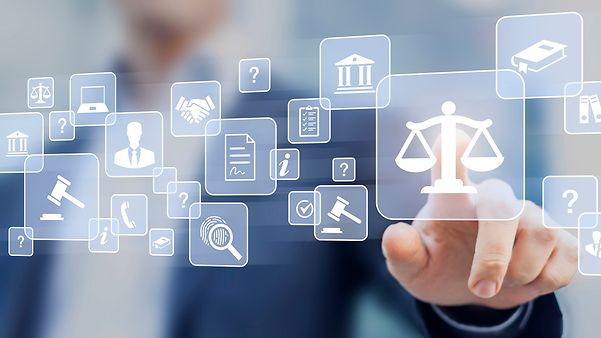 A person is pointing to an icon representing an administrative process that is to be digitised using SAP® solutions.