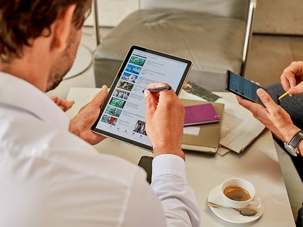 A woman uses her smartphone to access the local authority’s digital services.